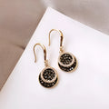 Black geometric round drop earrings with 3.6cm length and retro Hong Kong style design