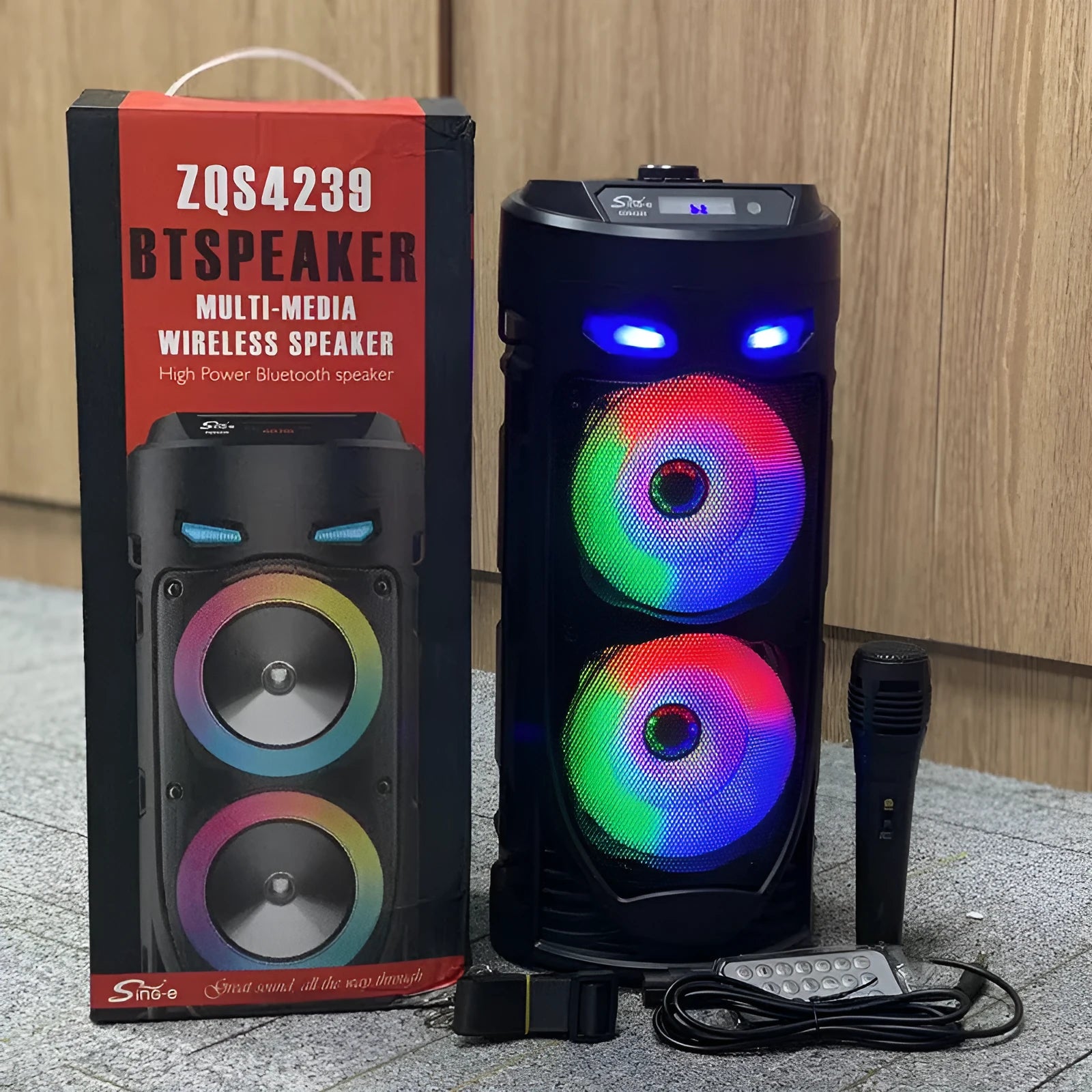 Black portable Bluetooth speaker with dual horn design and wheat aesthetic details