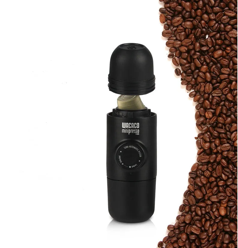 Black portable manual coffee machine measuring 6cm by 17.5cm with stainless steel components