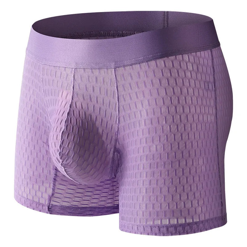 Men's white lace mesh boxer shorts with low waist design on a neutral background.