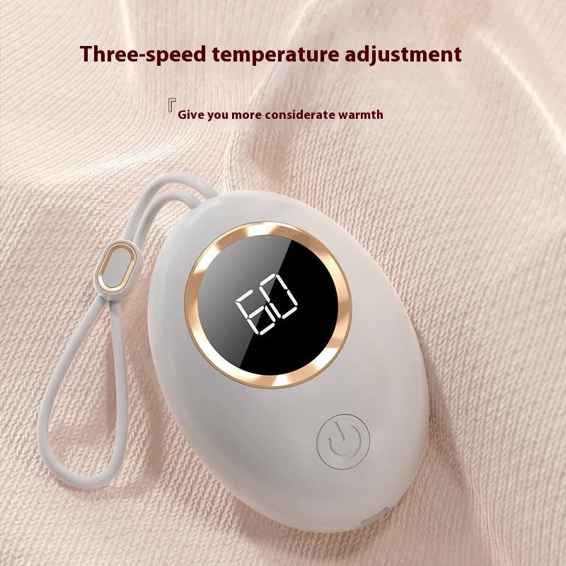 Compact USB digital display hand warmer in a choice of six colours, showing the heating pad and screen.