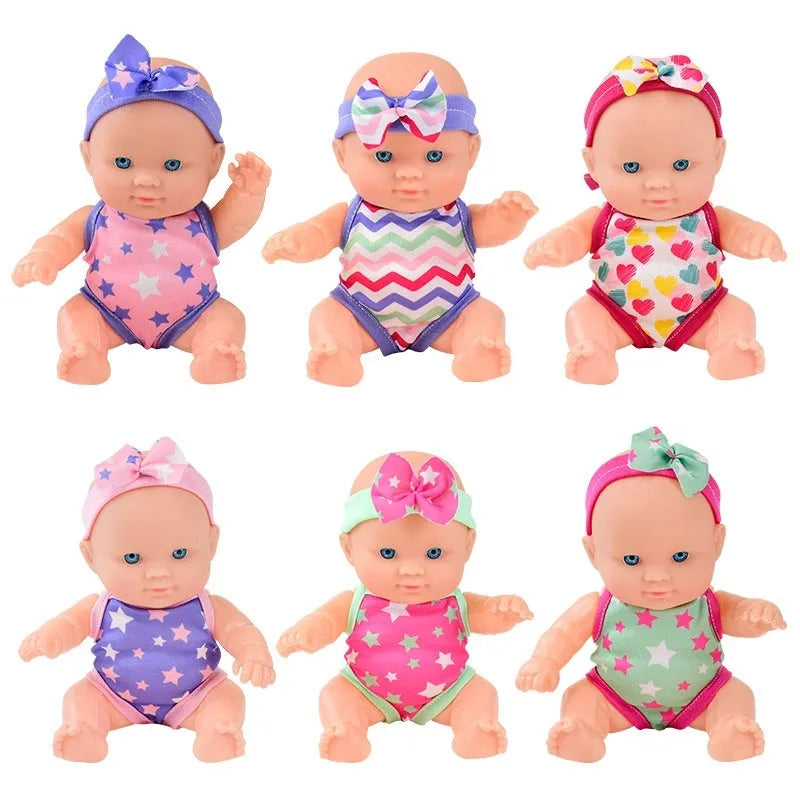 21.5cm tall simulation baby vinyl figurine doll in one of six colour variations on display