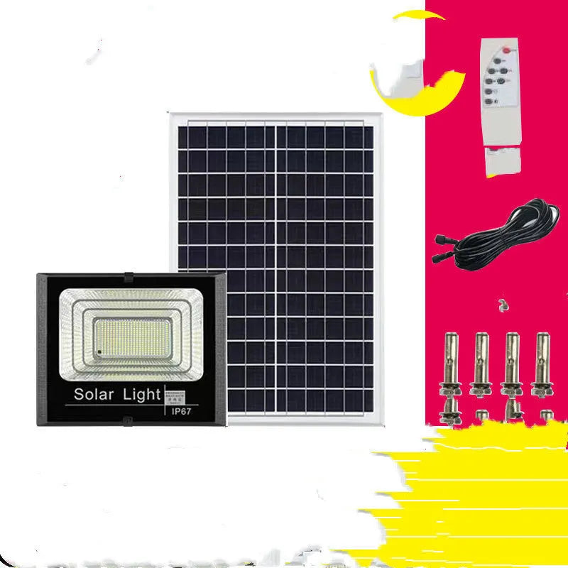 Black solar powered outdoor flood light with LED panels and remote control on a garden wall.