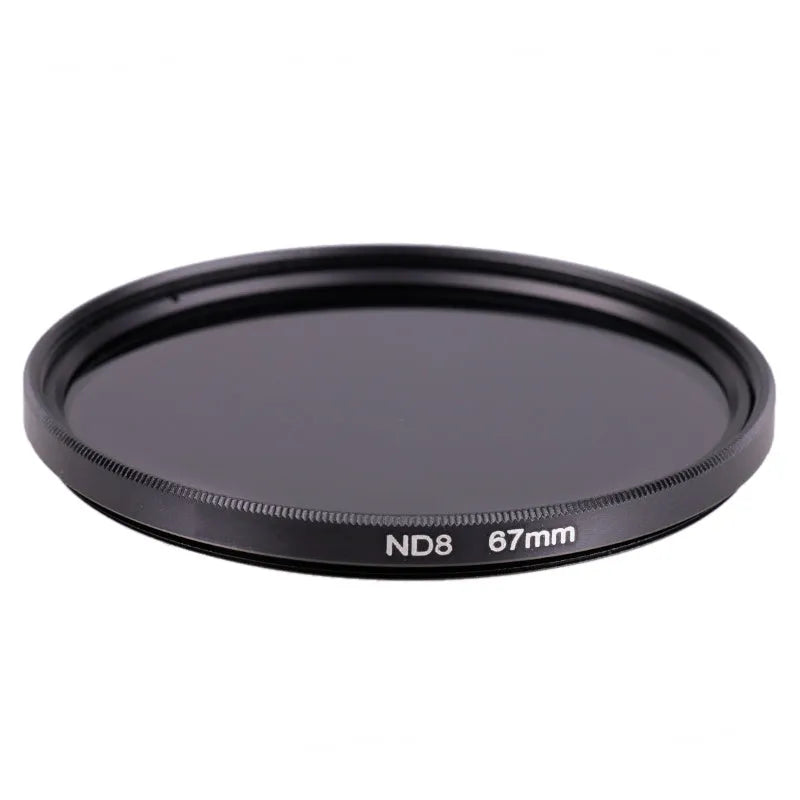 ND8 neutral density camera filter with aviation aluminium frame shown next to a lens.