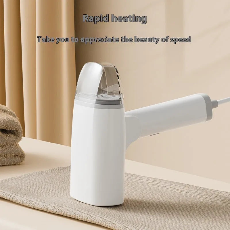 Blue or white handheld garment steamer with power cord and steam nozzle, showing compact size.