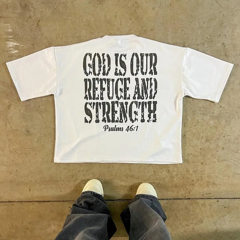 Retro style printed cotton T-shirt with drop shoulder sleeves on a neutral background