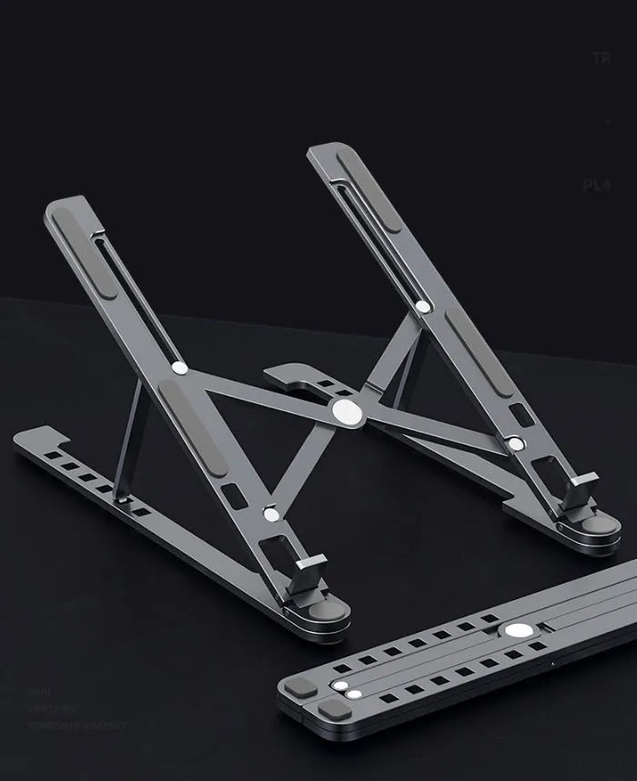 Silver aluminium laptop stand holding a MacBook, shown in both open and folded flat positions.