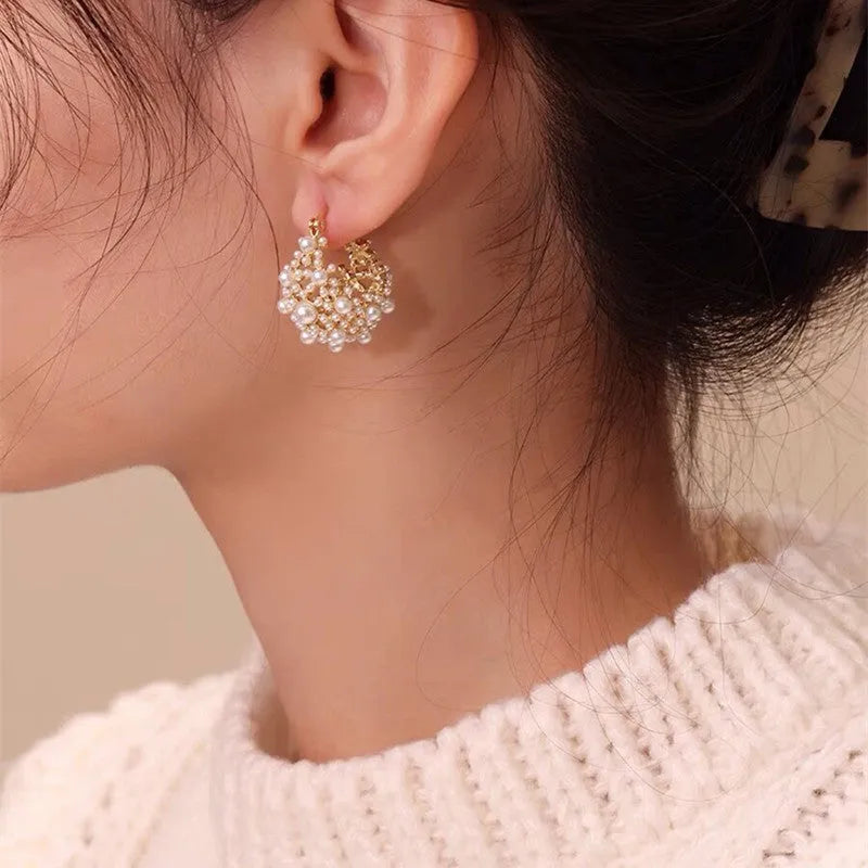 Gold copper flower basket earrings with pearl inlay and small rice-shaped beads
