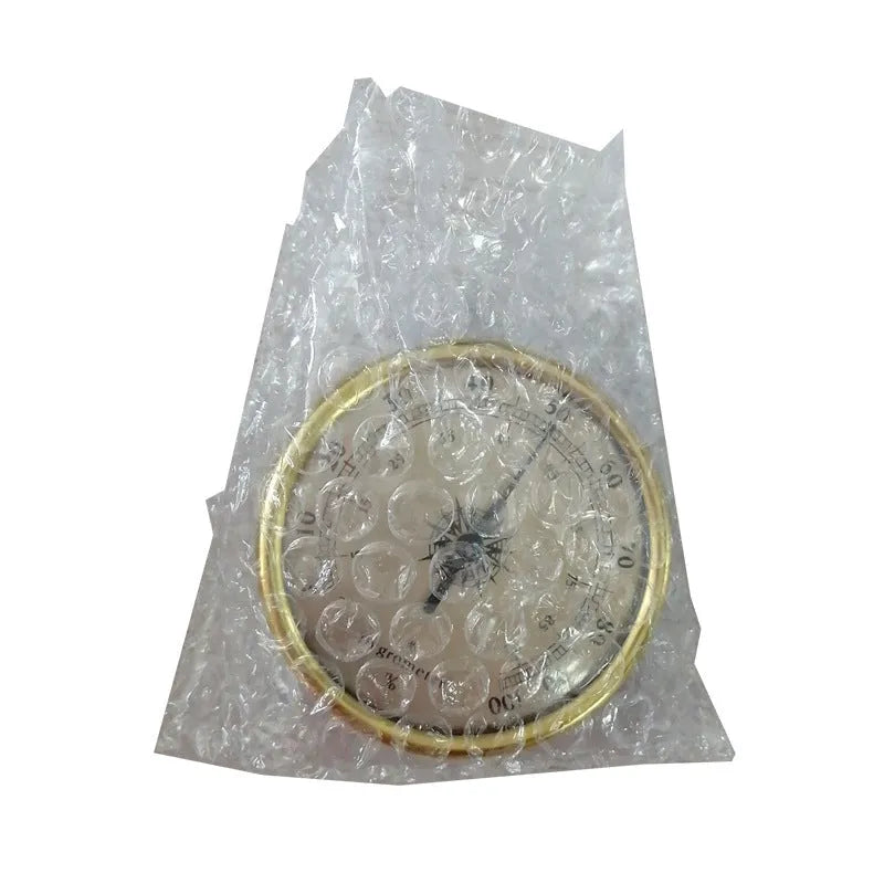 Circular aluminium analogue thermometer and hygrometer with temperature and humidity dials.