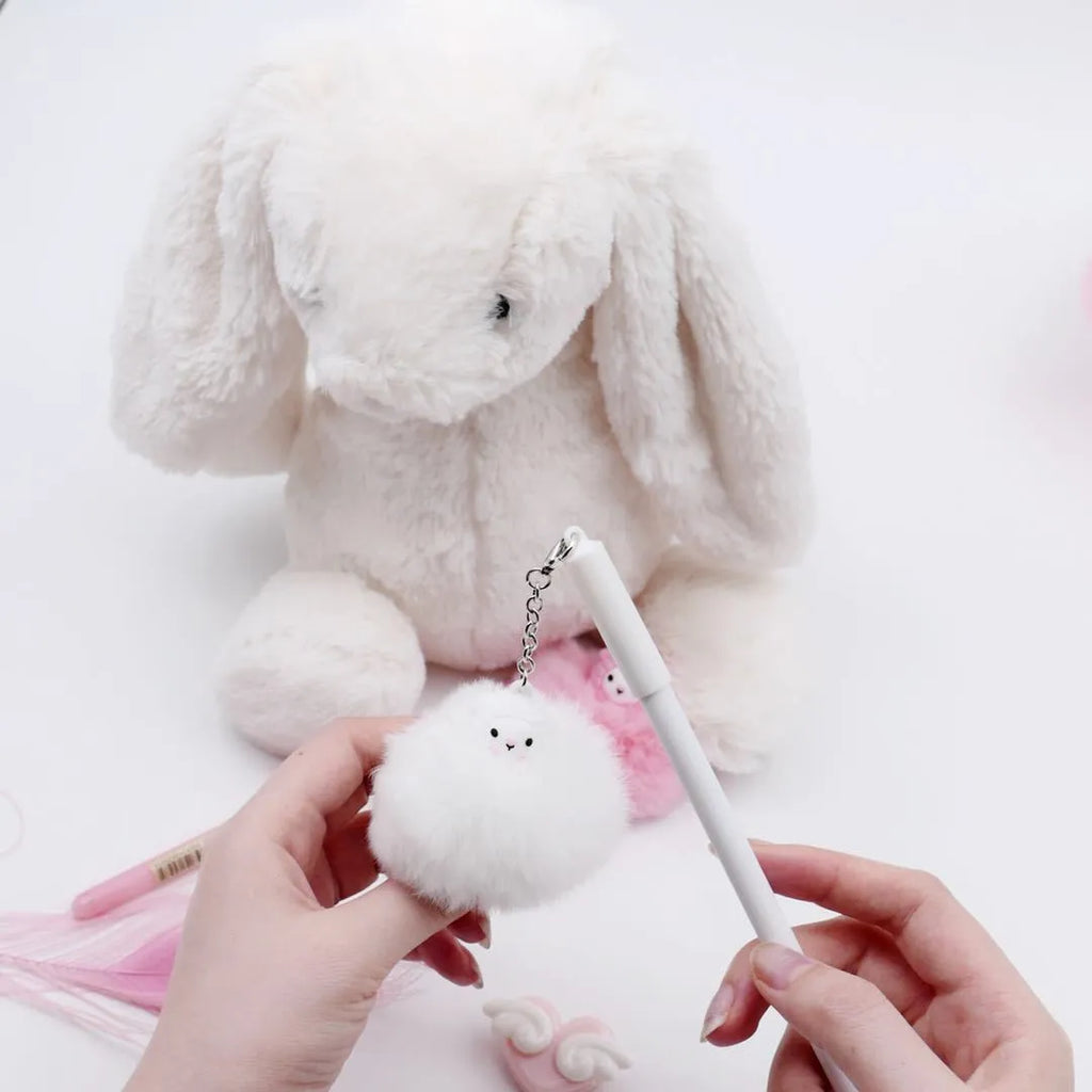 Alpaca hair ball pendant pen with neutral coloured barrel showing 0.5mm tip
