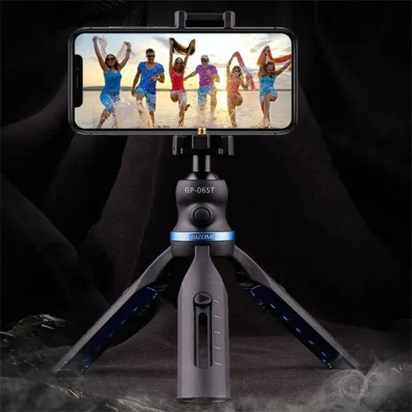 Black aluminium alloy and plastic desktop tripod stand holding a mobile phone.