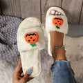 Halloween pumpkin plush slippers with synthetic fur and PVC anti-slip soles
