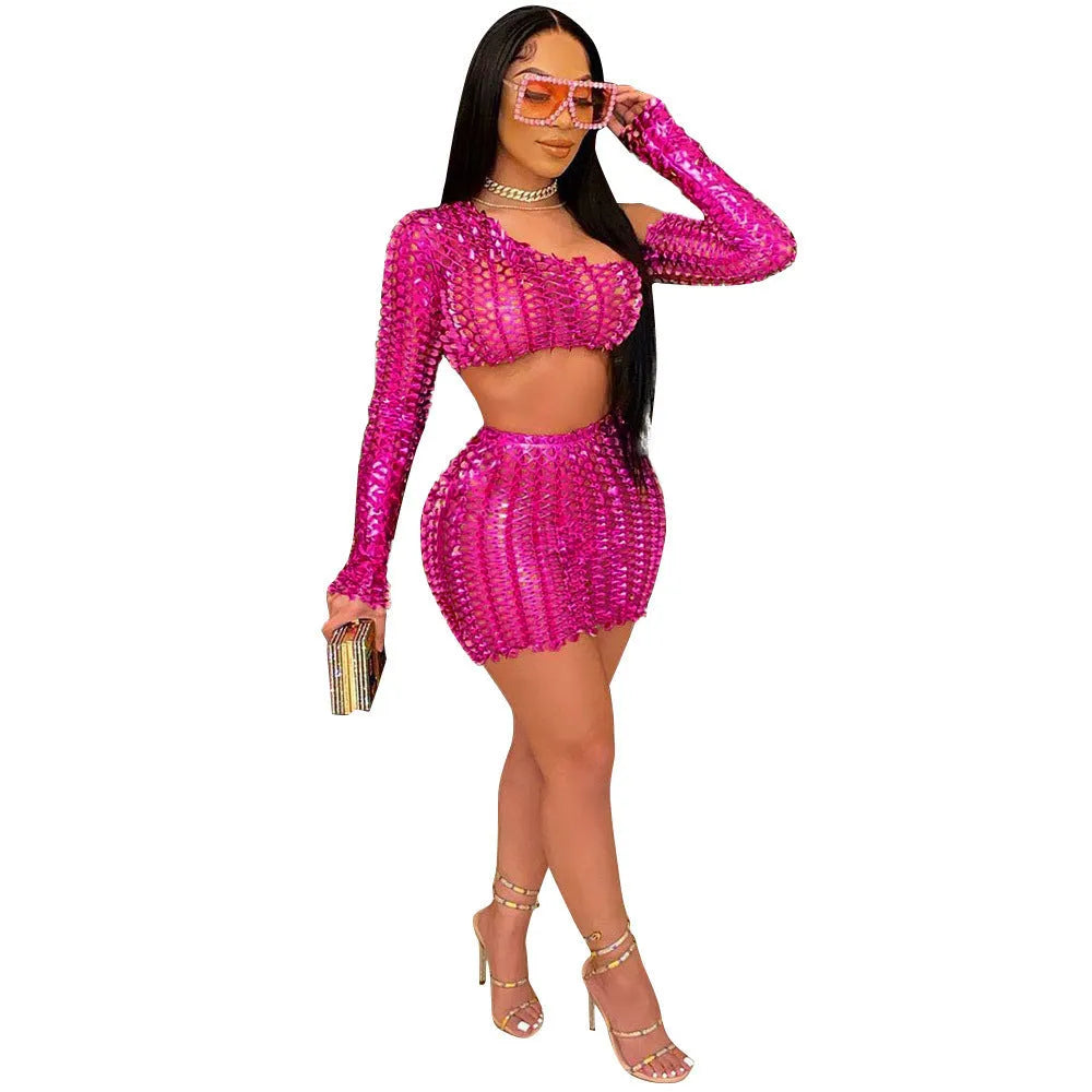 Women's black hollow-out two-piece dress set with net hole pattern showing sleeveless top and short skirt