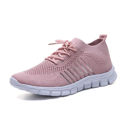 Women's breathable high-cut lace-up casual sneaker on a flat platform heel with a rubber sole.