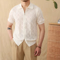 Light brown cotton short-sleeve cardigan with zipper and lapel collar laid flat.