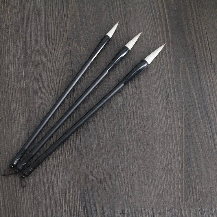 Traditional Chinese student writing brush with Jianhao nib on steel pipe barrel measuring 23cm length