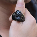Men's gold sheen obsidian Pixiu thumb ring on an alloy band, shown in domineering style.