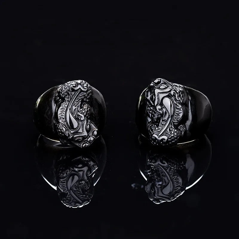 Men's gold sheen obsidian Pixiu thumb ring on an alloy band, shown in domineering style.