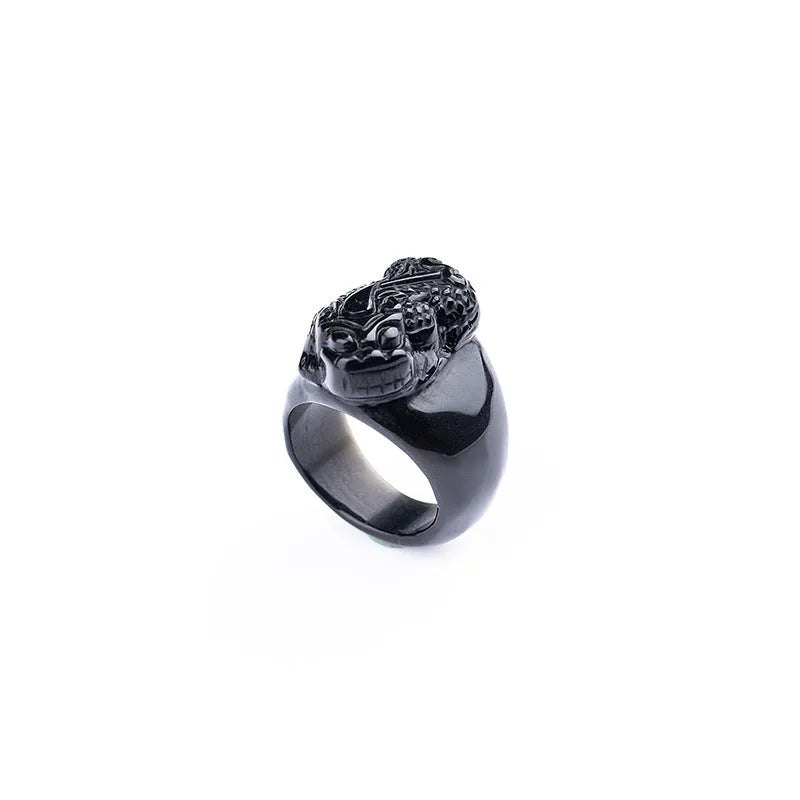 Men's gold sheen obsidian Pixiu thumb ring on an alloy band, shown in domineering style.