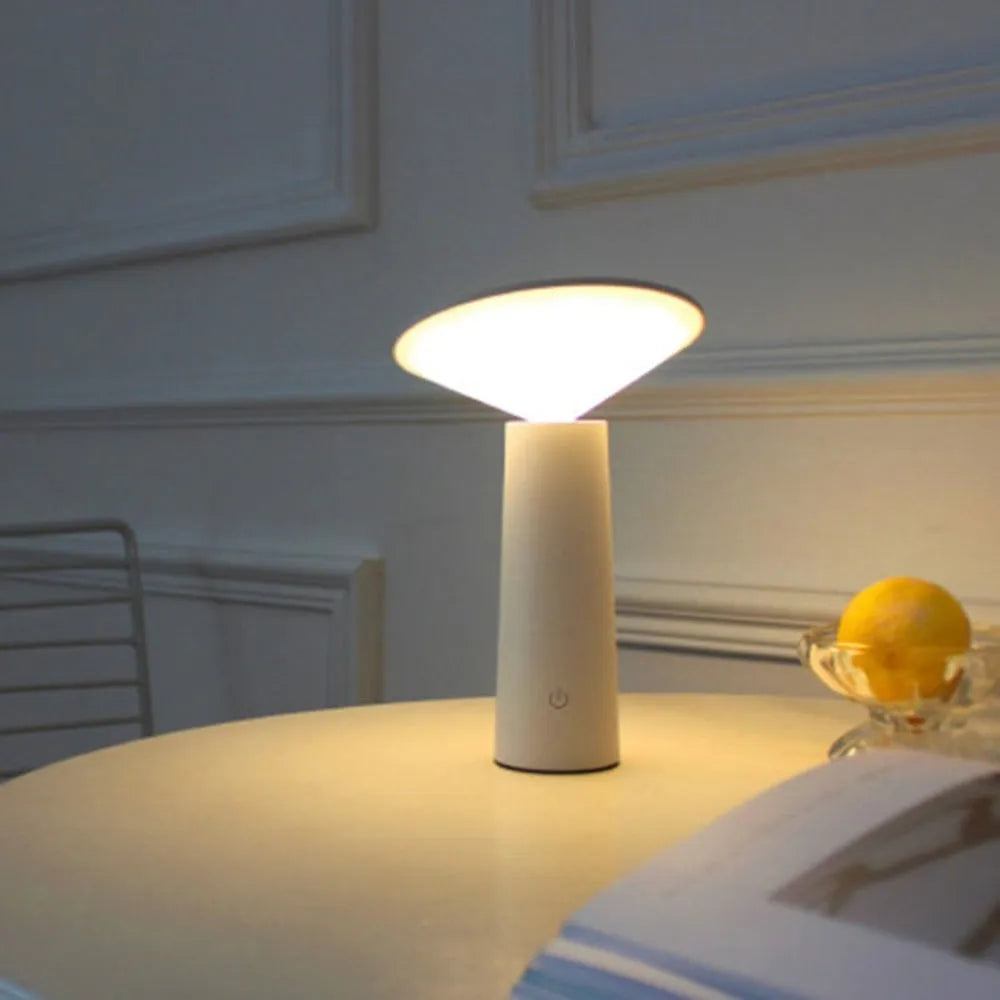 Black or white USB rechargeable LED desk lamp with touch sensor and adjustable flip head