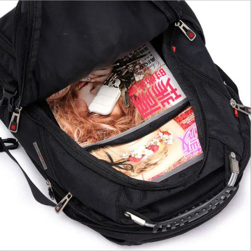 Black 38-litre business laptop backpack open to show multiple organisational compartments.