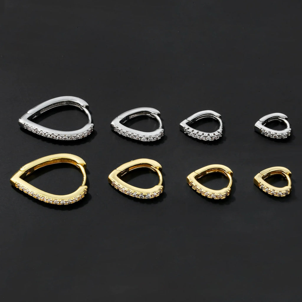 Women's copper geometric heart ear clip with electroplated gold finish and clip-on design