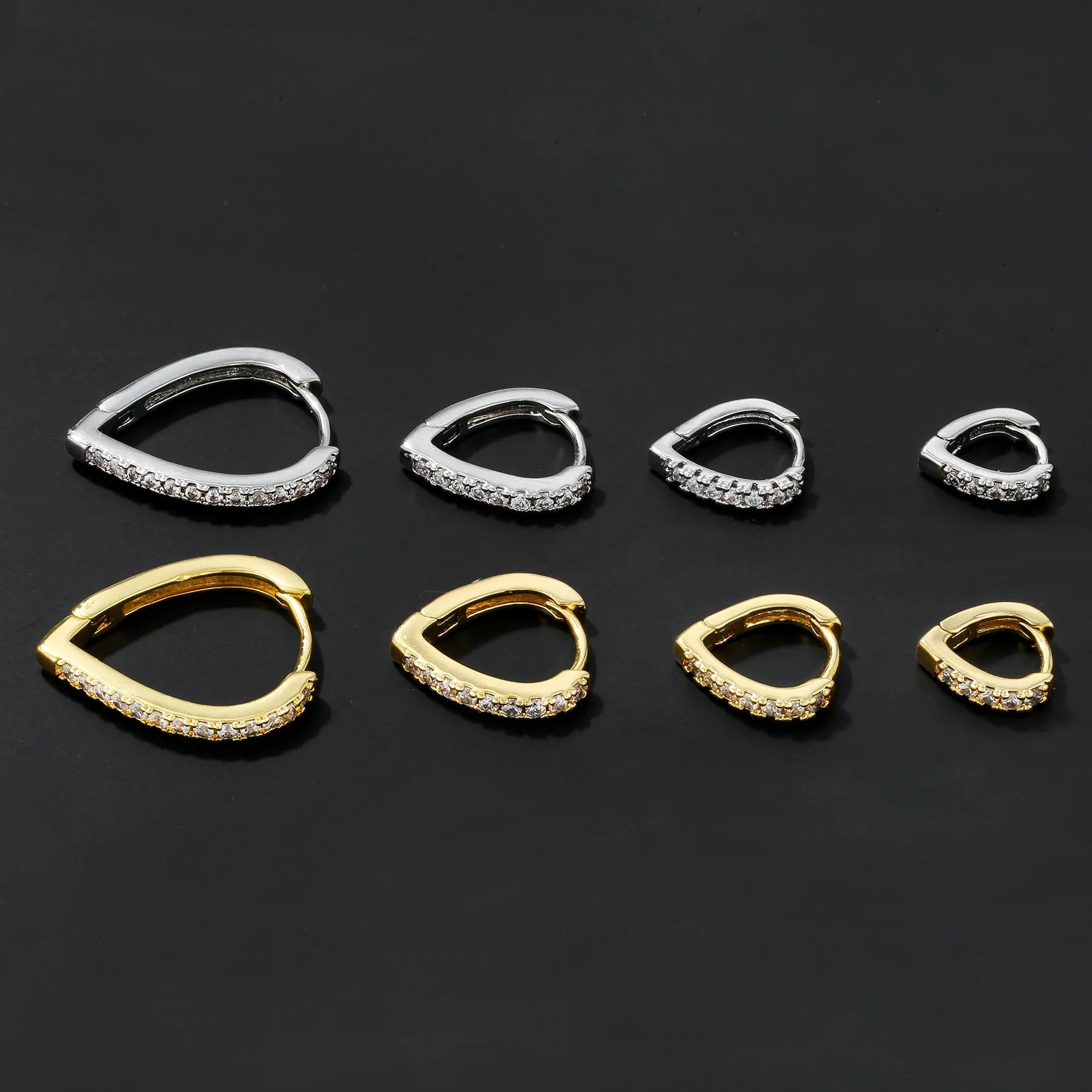 Women's copper geometric heart ear clip with electroplated gold finish and clip-on design