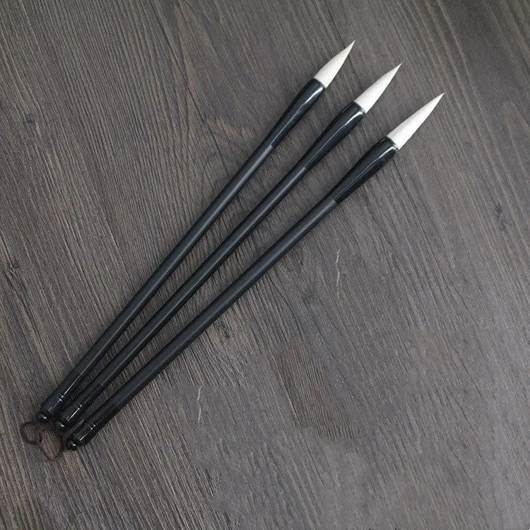 Traditional Chinese student writing brush with Jianhao nib on steel pipe barrel measuring 23cm length