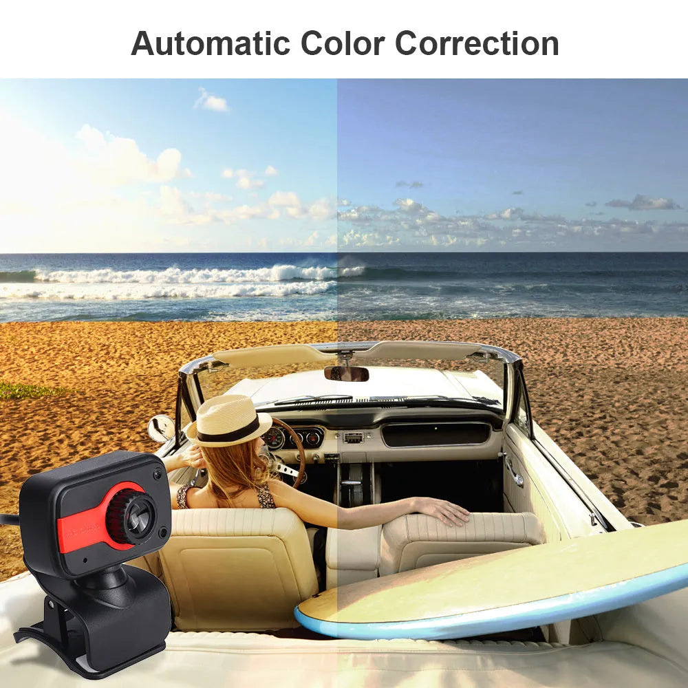 Blue mini USB webcam with a 360-degree rotating head on a desk next to a laptop.