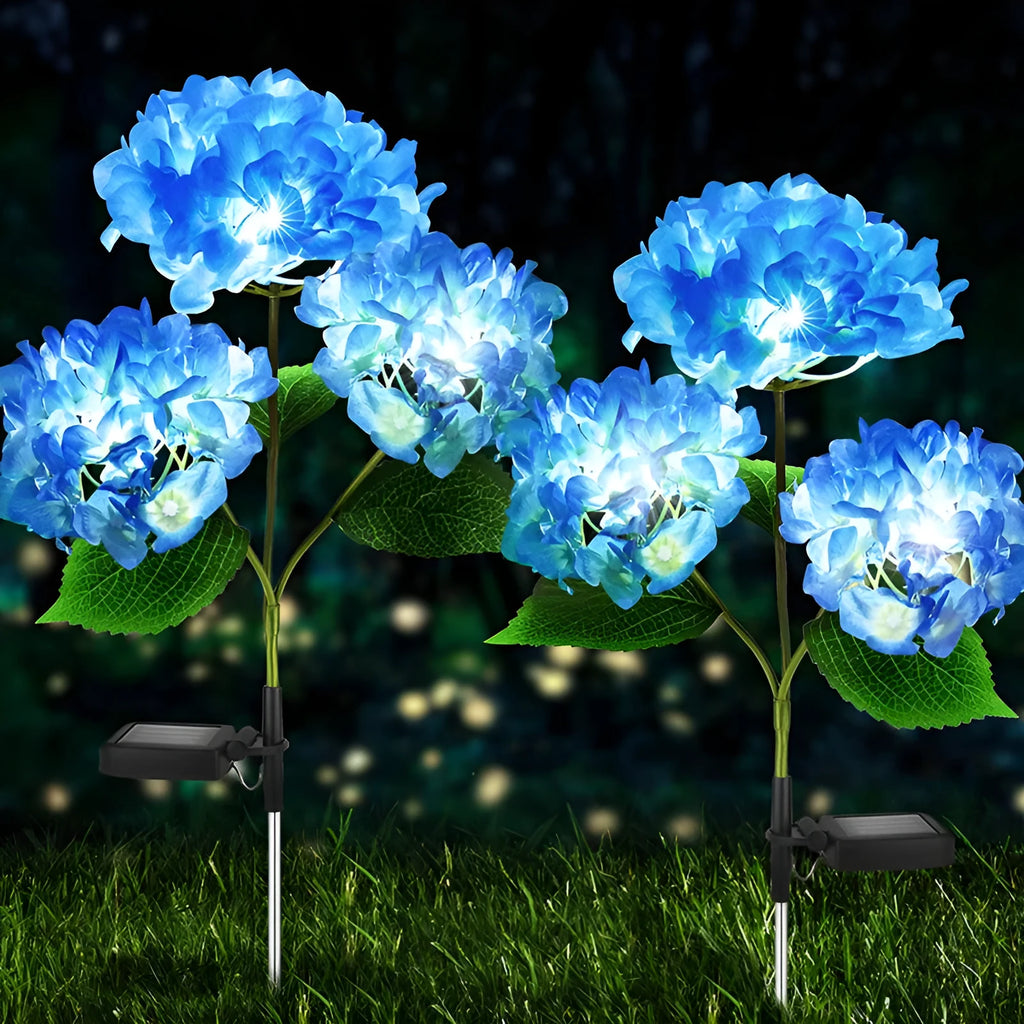 Solar hydrangea garden lights with plant-shaped design and floor outlet base in outdoor setting