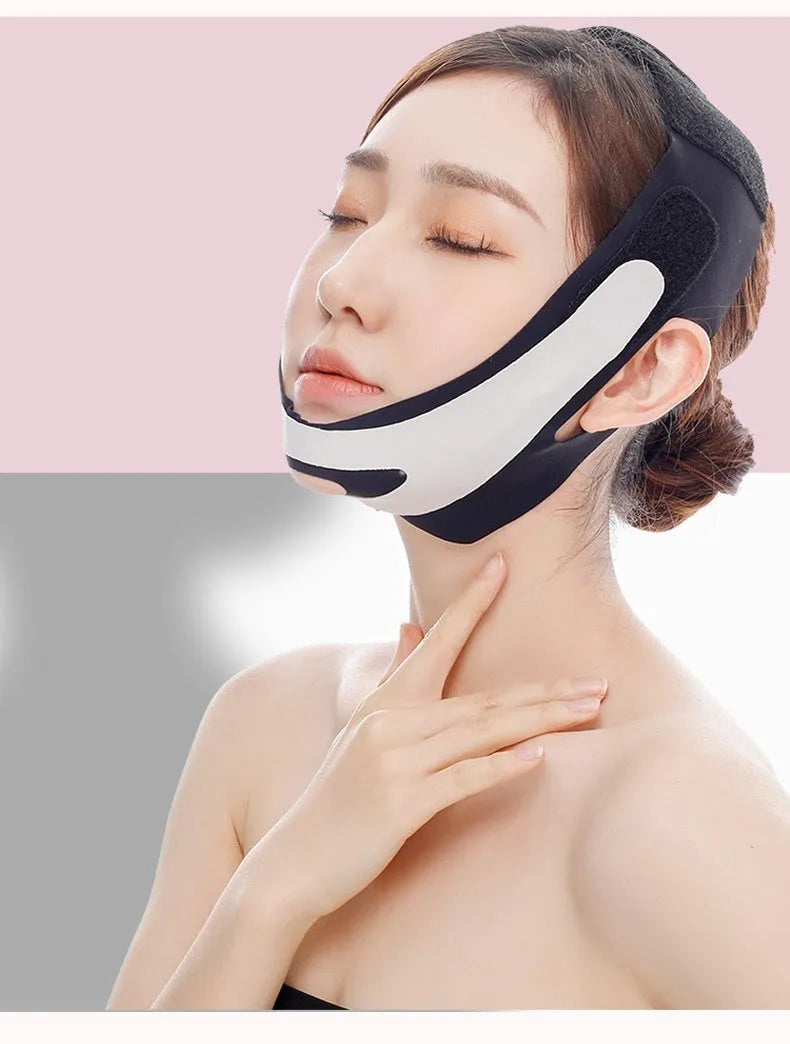 Pink and black elastic V-shaped face bandage for facial care.