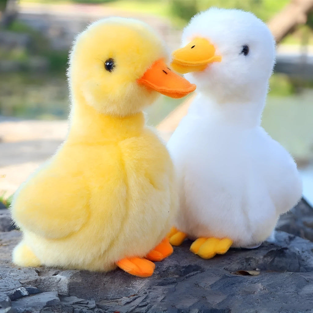 Simulation plush small yellow duck 17cm tall with soft fabric and sound feature for children