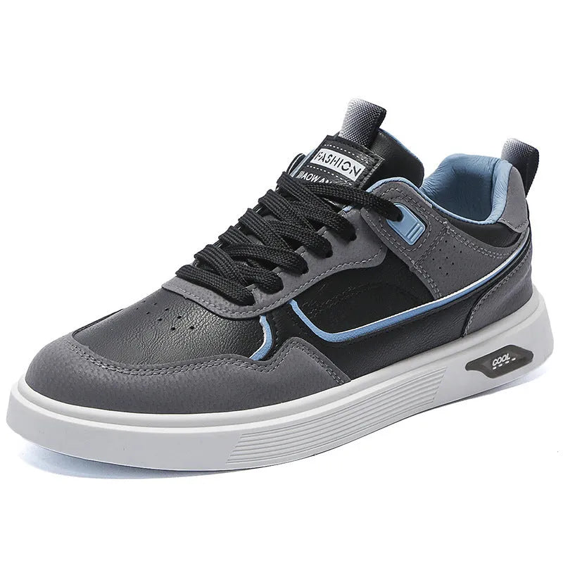 Men's low-top canvas trainers in black, beige, and grey with mesh lining and leather stitching.