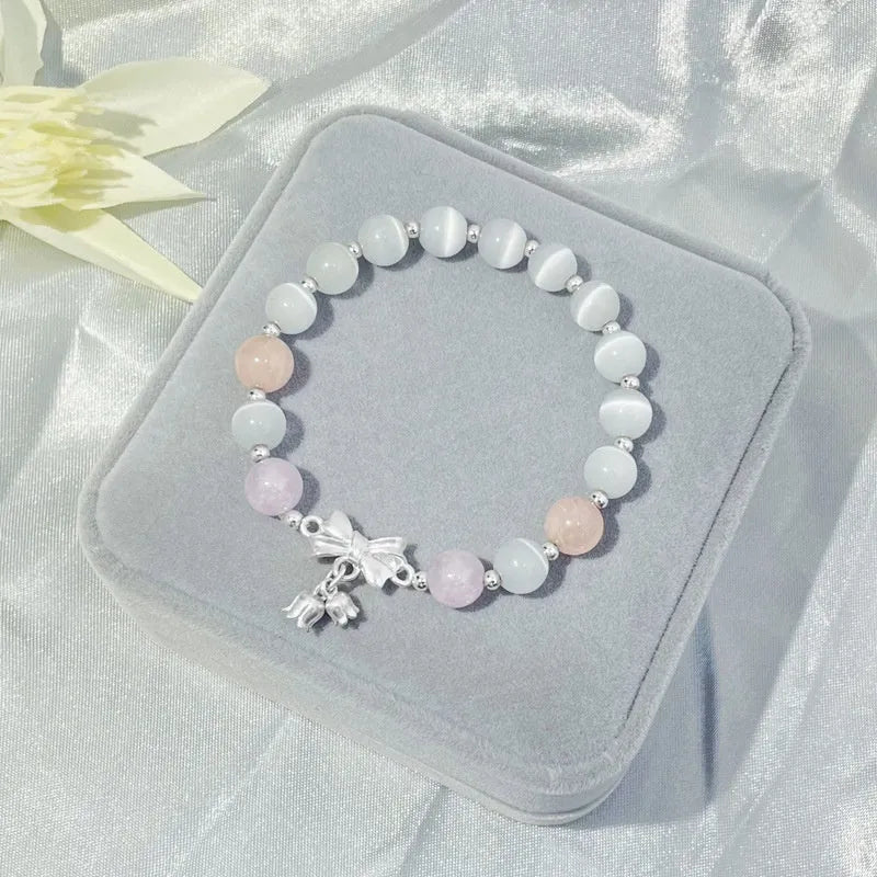 Lavender purple opal bracelet with bowknot design and 10mm crystal beads