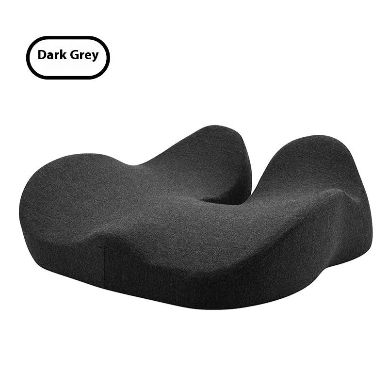 Light grey memory foam office chair cushion on a black desk chair.