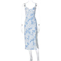 Womans blue lace floral print long dress with side slits and black suspender straps