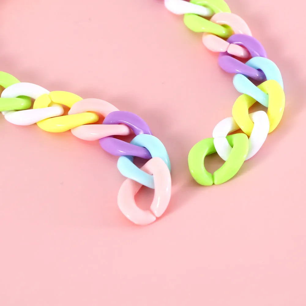 Macaron candy colour plastic pet collar on a white background, showing chain blue, pink, and mixed colour options for cats, dogs, and rabbits.