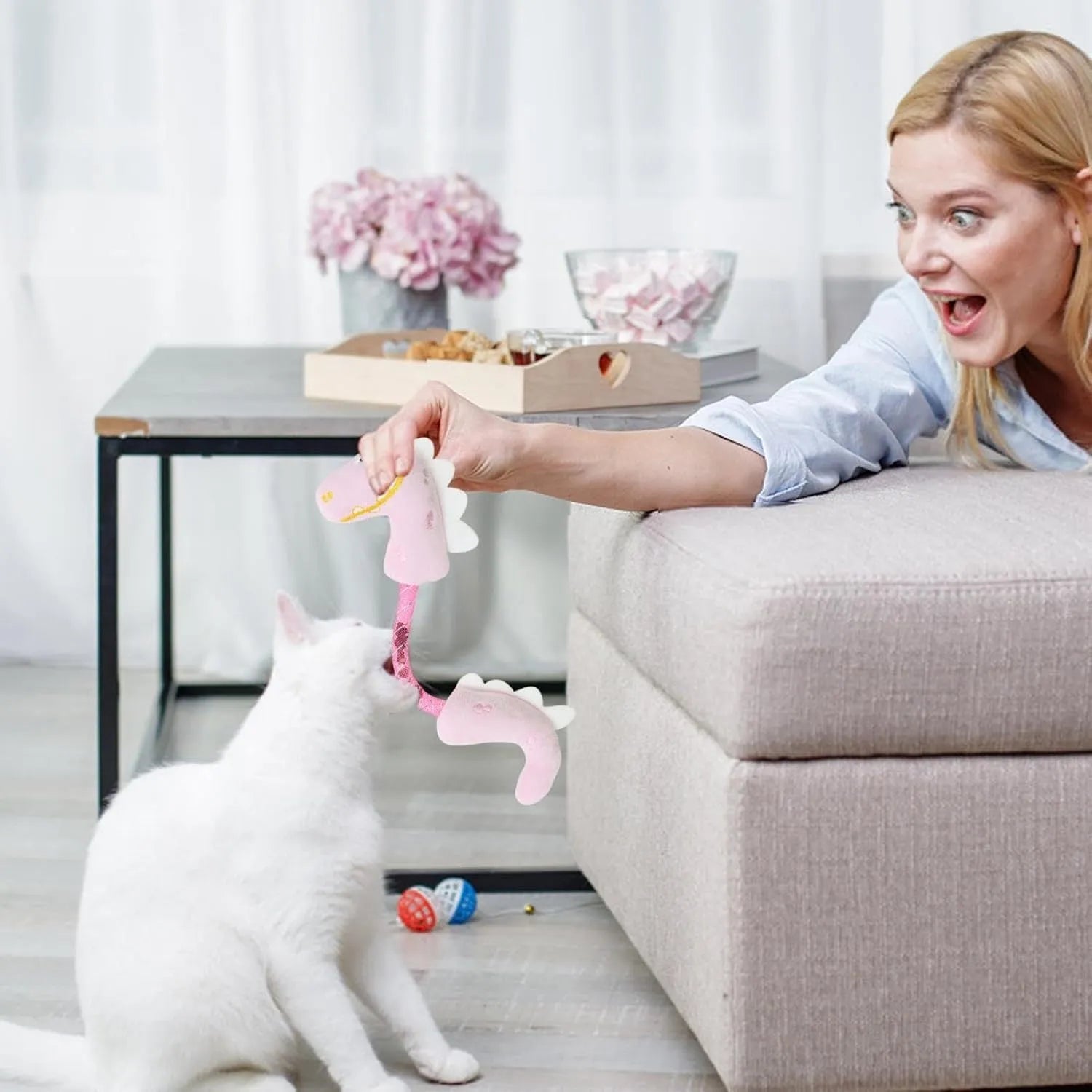 Four cat toys set showing catnip rope, plush mouse, plush fish, and plush bunny in pink, purple, yellow colours