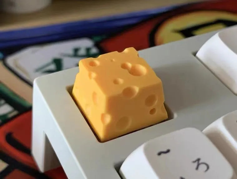 Yellow solid resin custom mechanical keyboard keycap with detailed cheese design