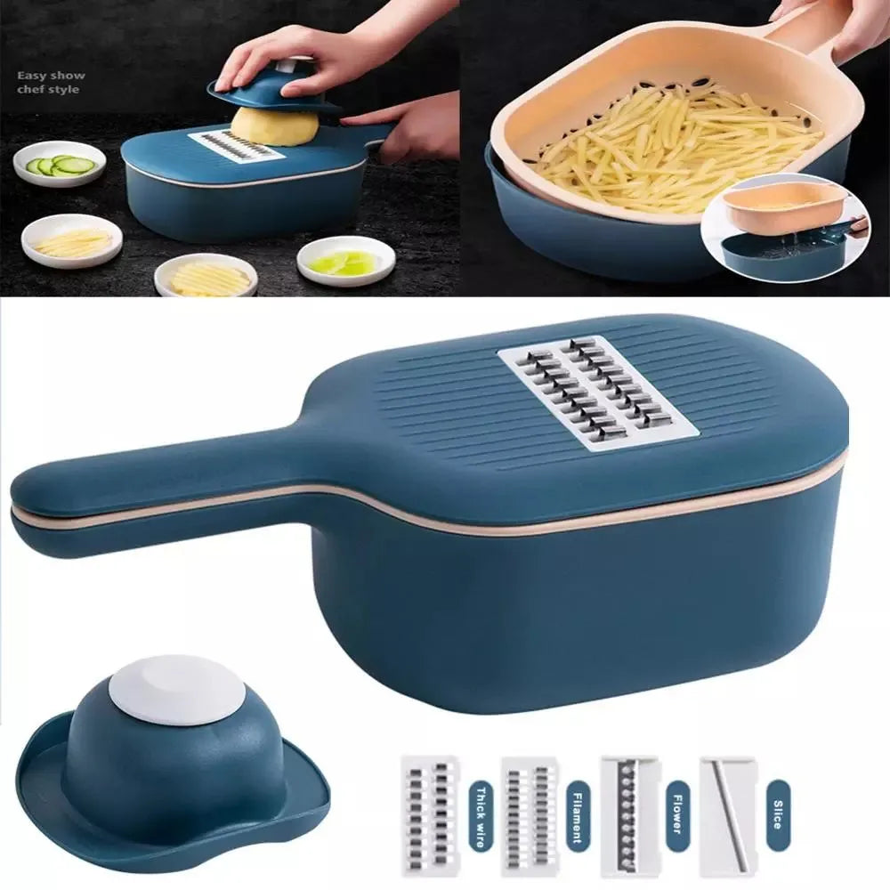Dark blue vegetable cutter with four stainless steel blades, drain basket, and hand guard on a kitchen counter.