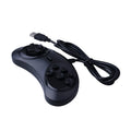 Black Sega USB wired PC game controller with 1.8-metre cable next to a computer.