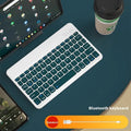 Bluetooth keyboard for tablet in multiple colour options including white, green, pink, and lavender.