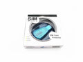 Blue external USB SIM card reader for mobile phone data backup and transfer.