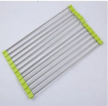 Stainless steel folding kitchen drain rack with plastic tubes in a kitchen sink