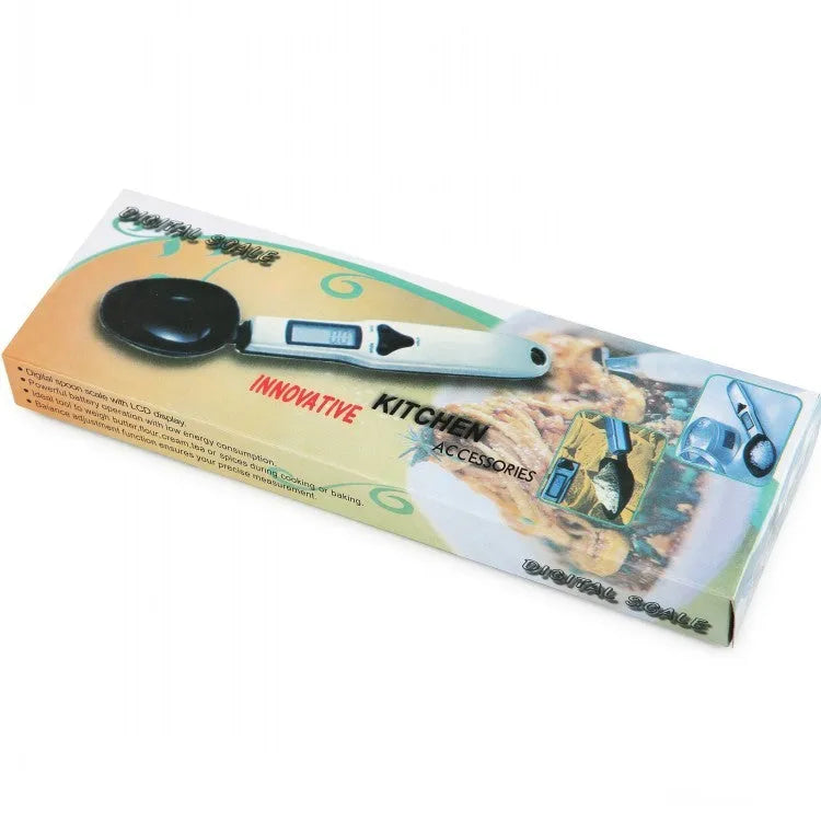 Digital smart measuring spoon with LCD screen showing weight, placed next to mixing bowl.