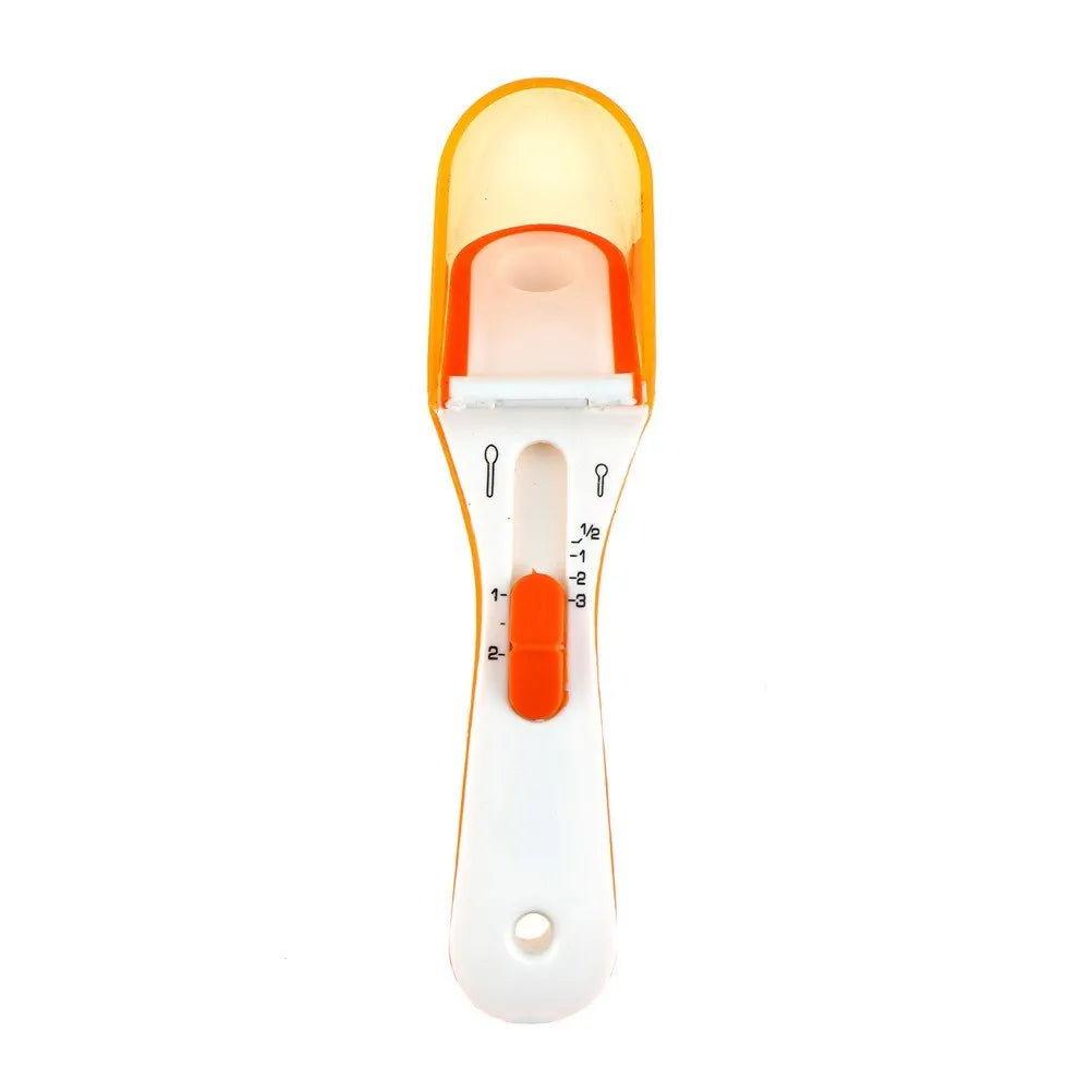 Blue and orange digital measuring spoon with magnetic bottom for kitchen storage