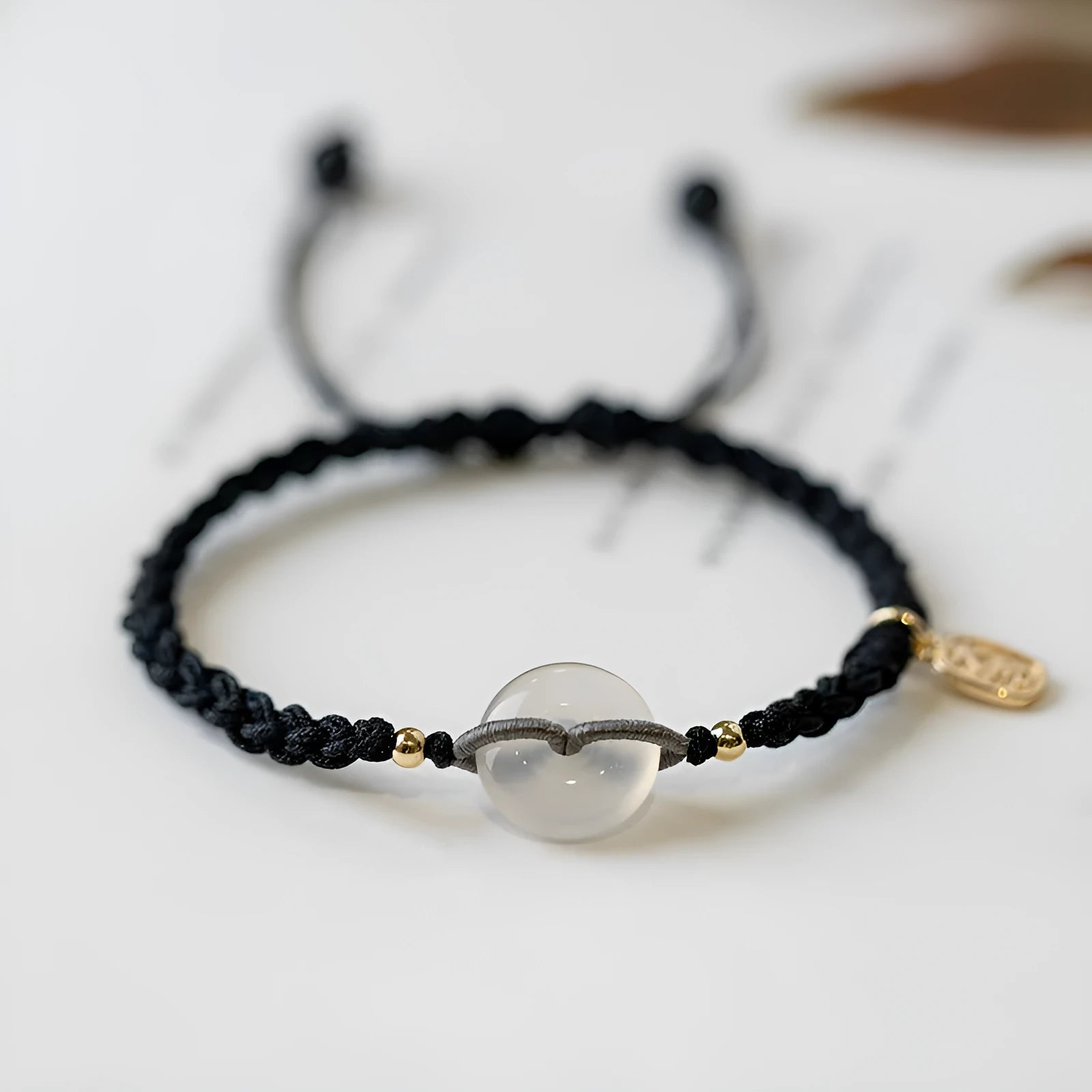 Women's crystal bracelet with vintage weaving and flower-shaped chamfered crystals on rope strap