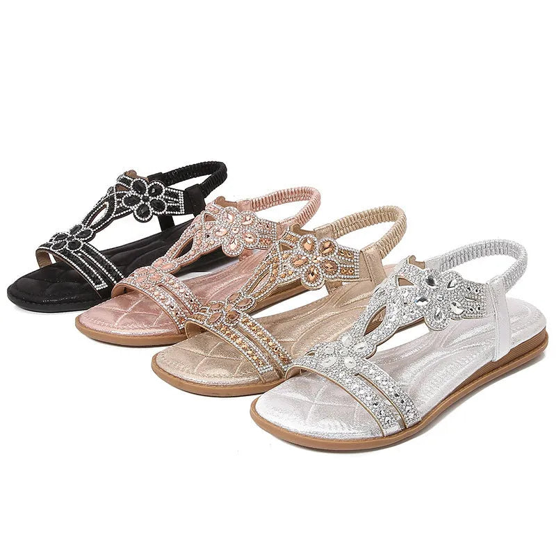 Women's flat sandals with bohemian flower and rhinestone decoration on PU upper, round toe, available in multiple colours