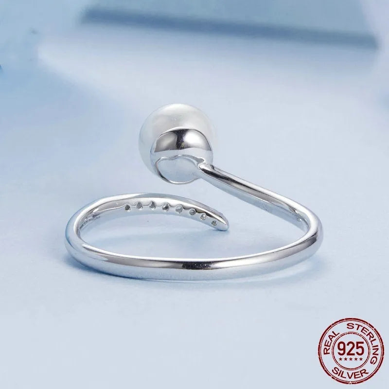 Adjustable open loop ring with shell pearl element in S925 sterling silver alloy