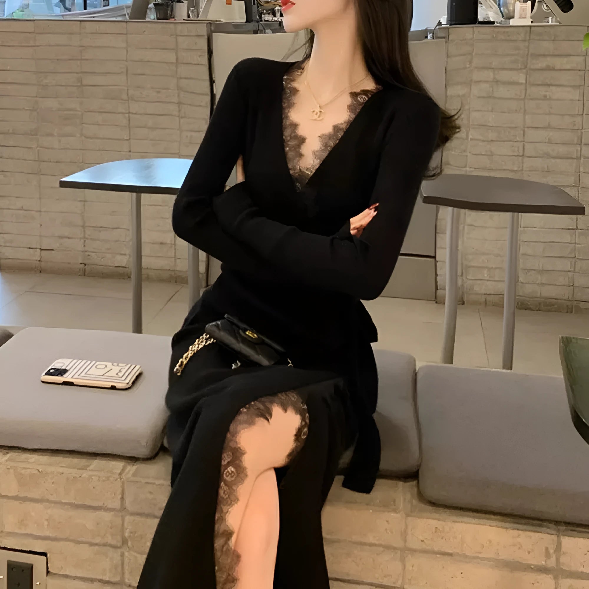 Black women's slim fit woolen princess dress skirt on a model.